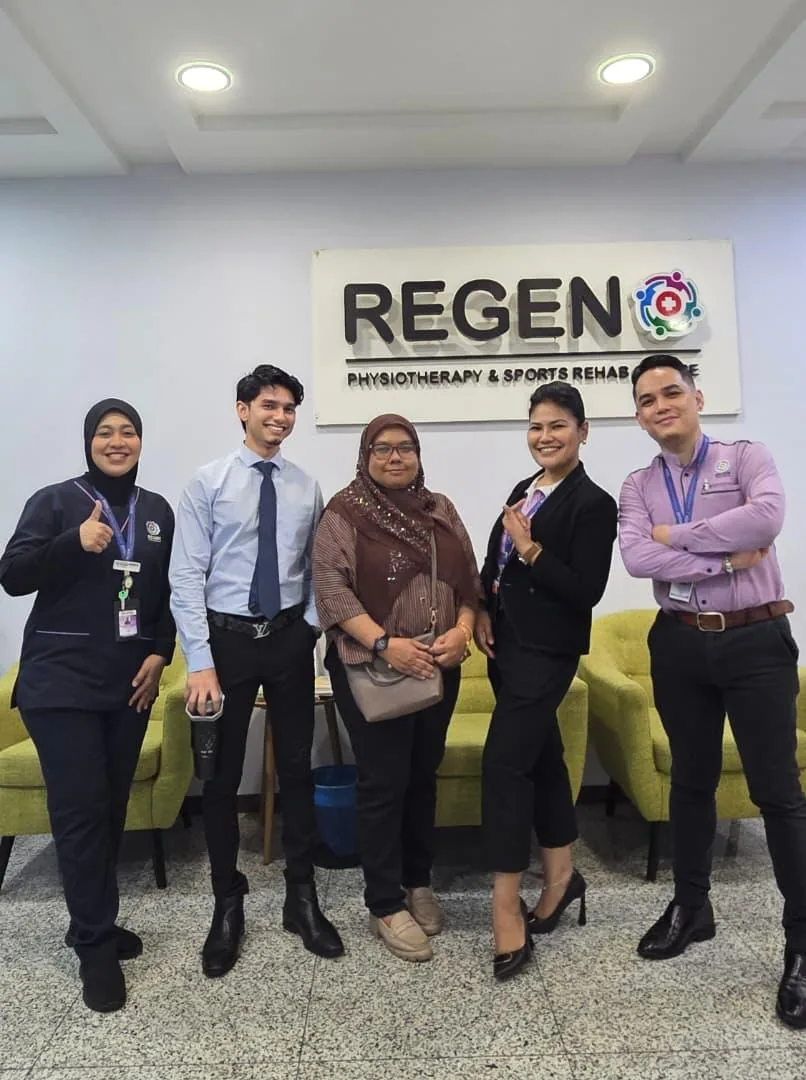 Mr Puven and Ms Hana with the REGEN Physiotherapy & Sports Rehab Centre team