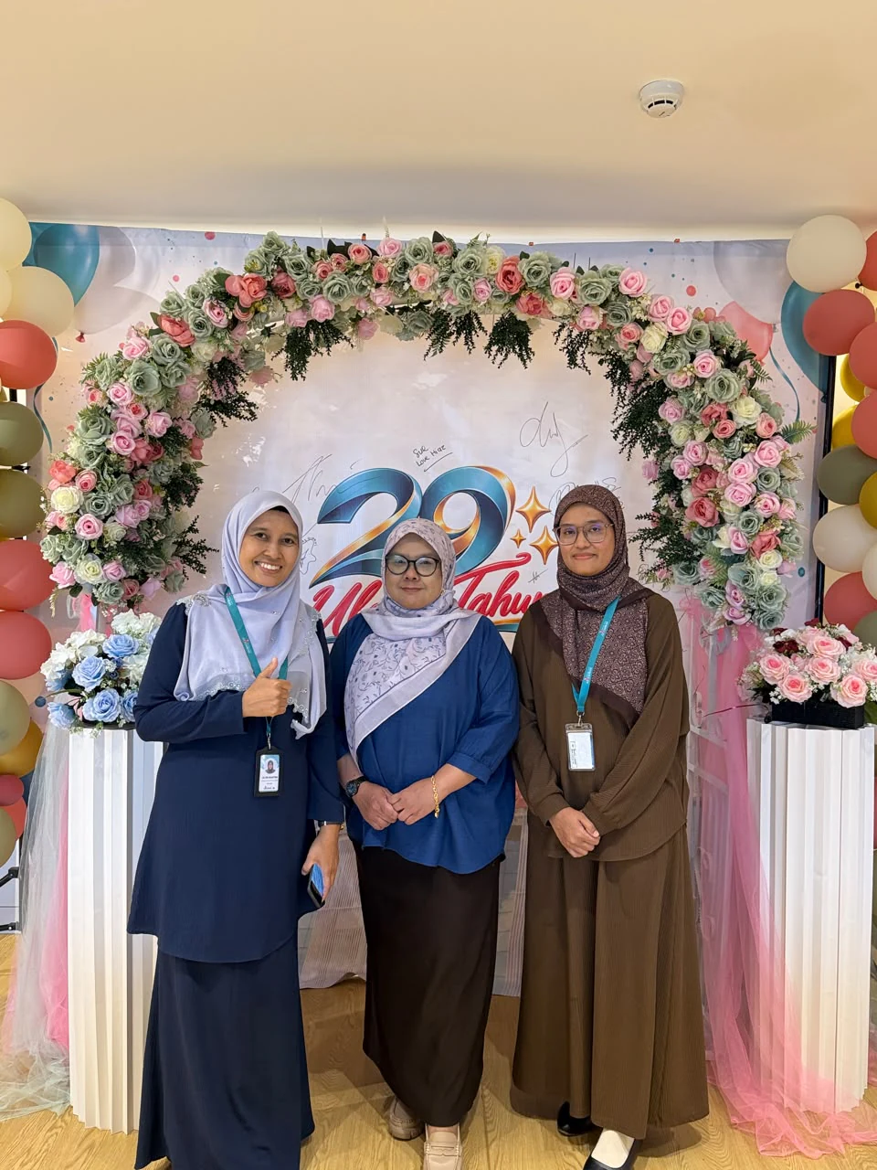 Ms Hana and Hospital Islam Az-Zahrah representatives at the hospital's 29th anniversary celebration